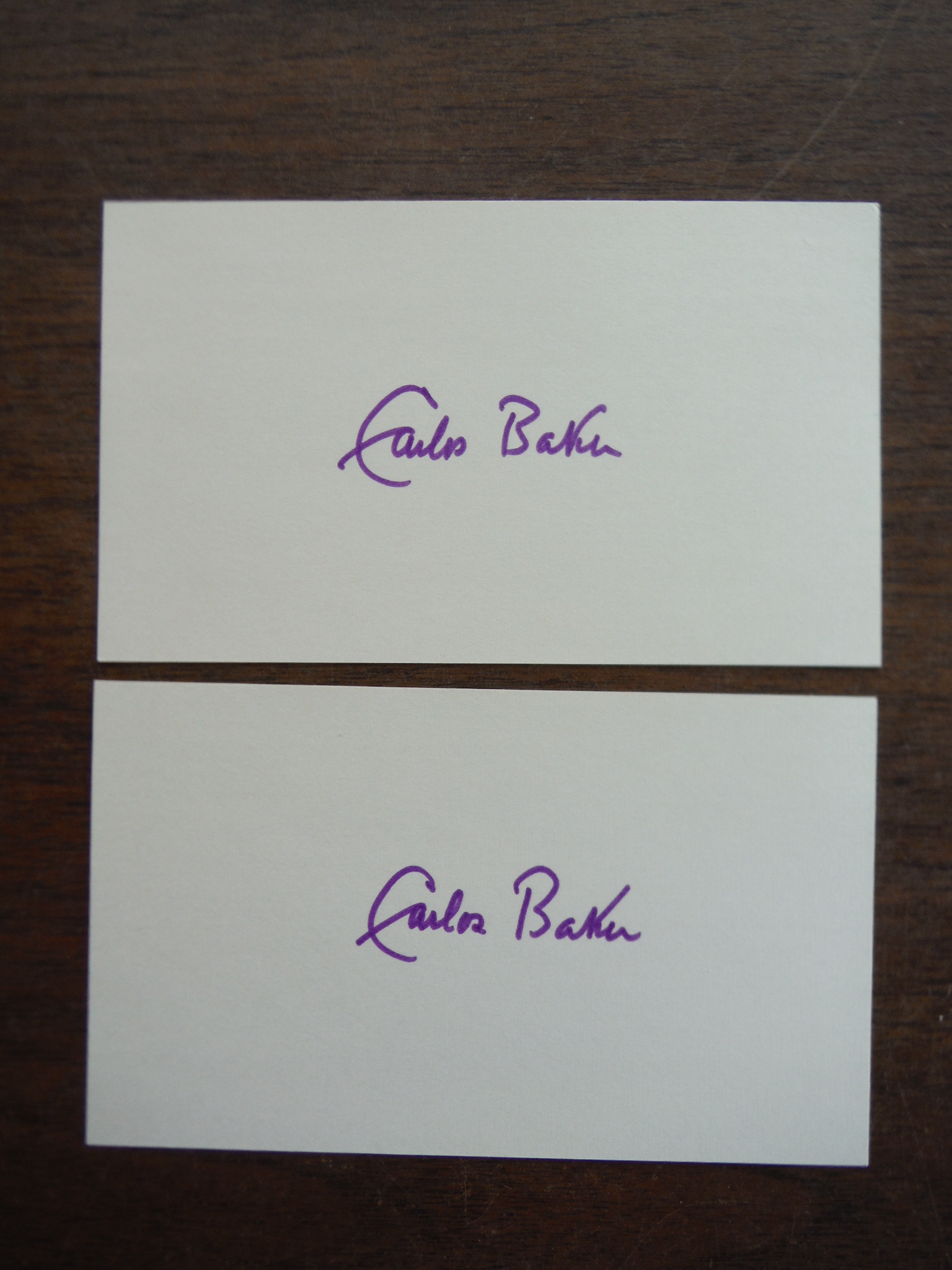 2 Autographs of  Carlos Baker.