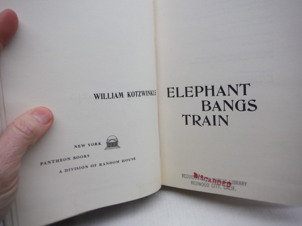 Image 1 of Elephant Bangs Train.