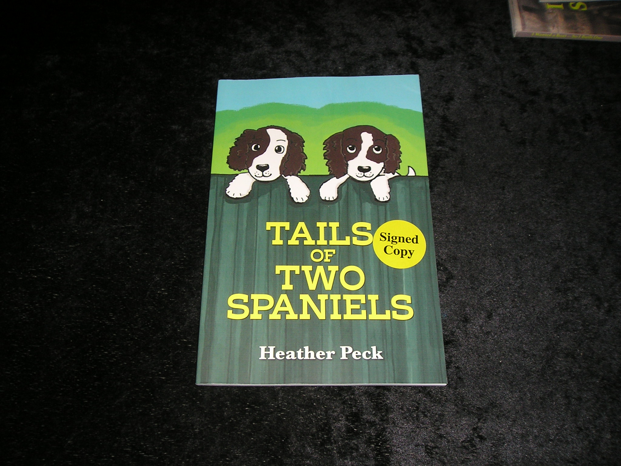 Image 0 of Tails of Two Spaniels